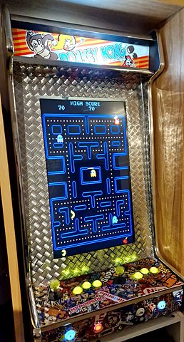 Bartop glowing at night, Pac-Man on screen
